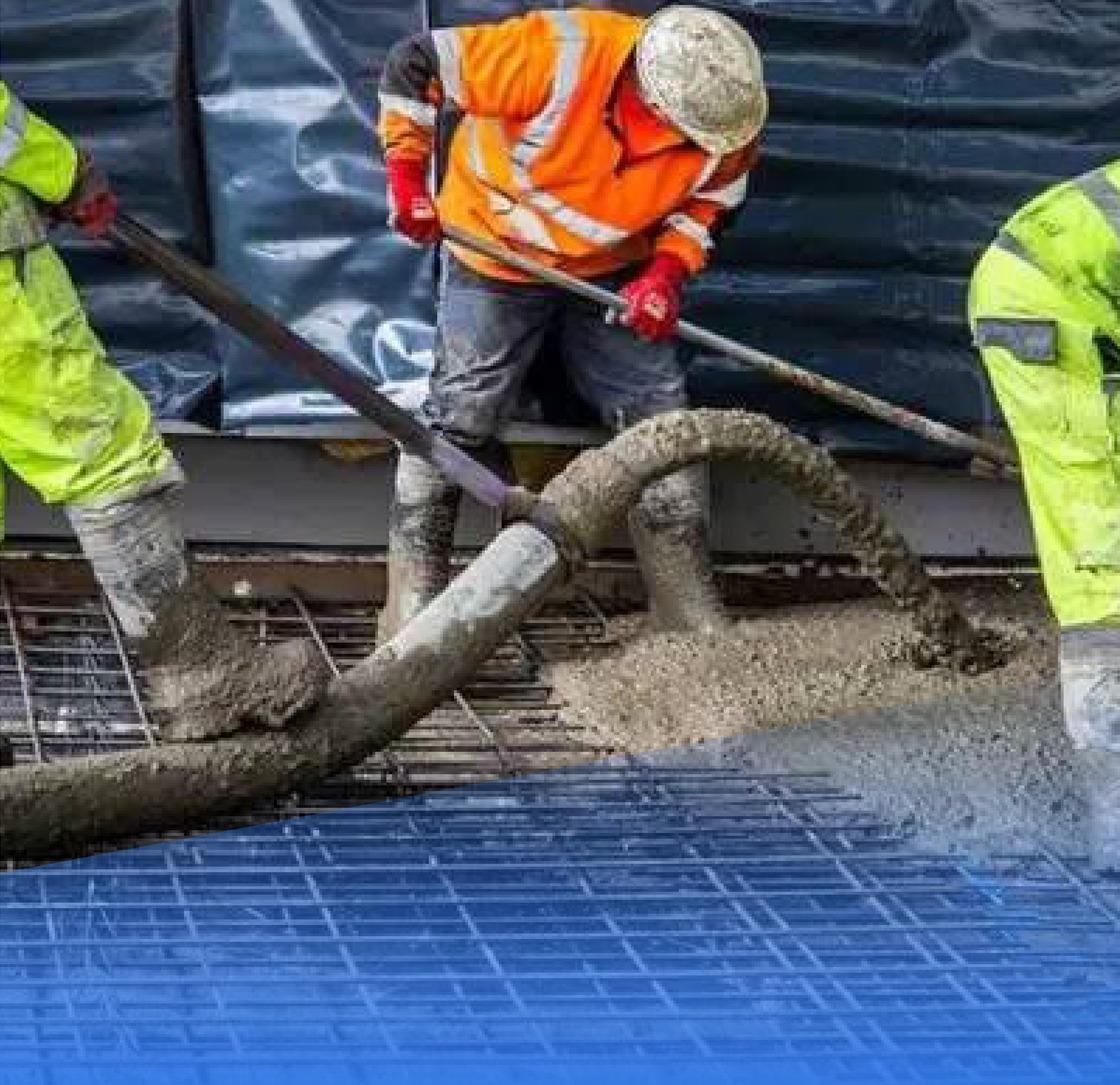 Truck-mounted concrete pumping into structural elements on a Behl Construction site